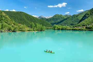 Kayaking on Soca River in Most na Soci, Slovenia. © adamzoltan