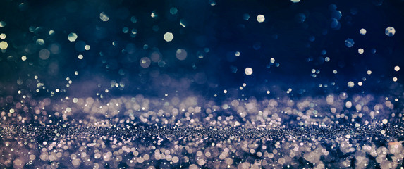 Christmas light background.  Holiday glowing backdrop. Defocused Background With Blinking Stars. Blurred Bokeh.