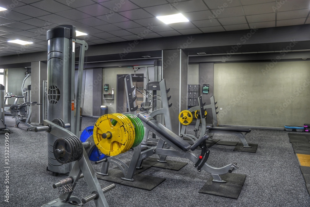 Wall mural man working out in gym