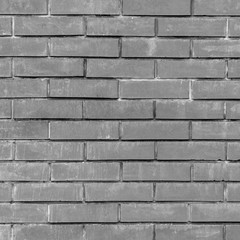 Brick wallpaper, texture. Background for creative design. There are scuffs on the rough surface.