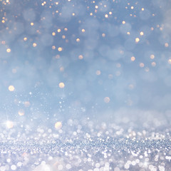 Christmas light background.  Holiday glowing backdrop. Defocused Background With Blinking Stars. Blurred Bokeh.