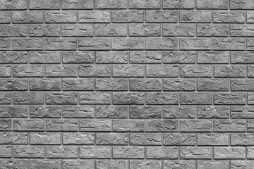 Gray brick texture and background. Silver wallpaper for designer. Rectangular photo, image.
