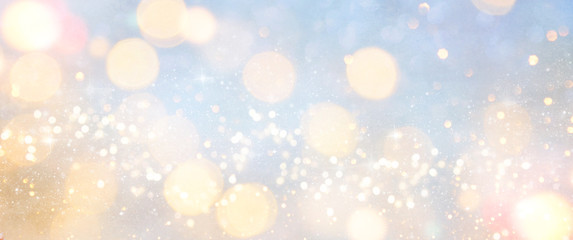 Obraz premium Christmas light background. Holiday glowing backdrop. Defocused Background With Blinking Stars. Blurred Bokeh.