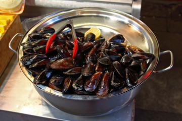 Plate with stuffed mussels in street market at Istanbul, Turkey. Turkish street food