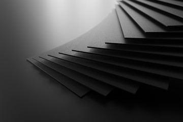 3D rendering of black stacked squares on black matte surface