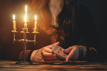 Fortune teller is reading a tarot cards concept. - obrazy, fototapety, plakaty