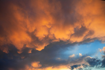 Fototapeta premium Sunset in dark clouds
