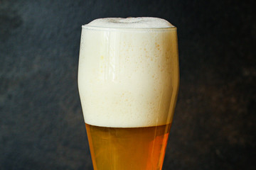 beer in a glass
Menu concept serving size. food background top view copy space for text