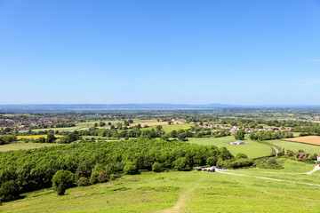Fototapeta premium View of the countryside in the Cam Long Down from Cam Peak, Cotswolds, Gloucestershire, UK