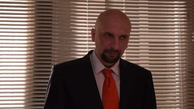 A spy photographs secret documents with a small camera. Collecting dirt on applicants, undercover work of a special AGENT, intelligence and agents.1