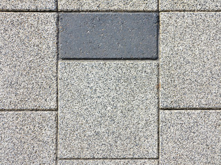Fototapeta premium Seemingly pattern of grey color concrete road pavement brick of the pedestrian pathway