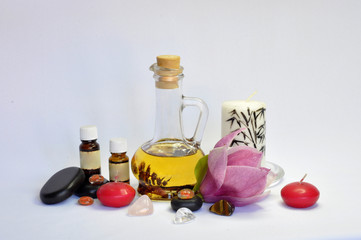 spa still life with essential oils and flowers