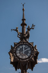 Fototapeta na wymiar Bronze composition with the clock set at the beginning of Bauman street in Kazan