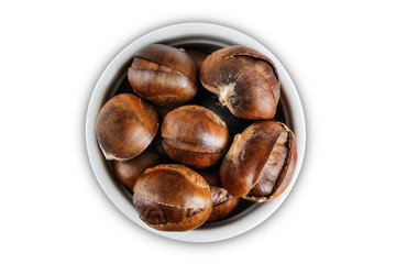 Chestnuts in a white bowl on a white isolated background