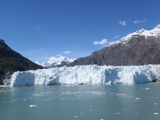 Alaskan glacier canal mountains ice and snow on a sunny blue sky day spring 2018