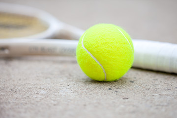 Tennis racket and ball. Macro image.