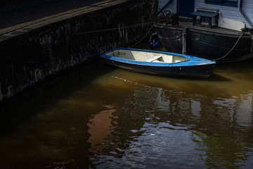 Fototapeta na wymiar Rowing boat on the river in Groningen, Holland 