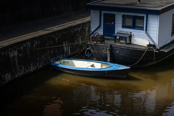 Fototapeta na wymiar Rowing boat on the river in Groningen, Holland