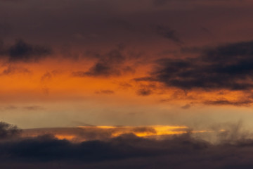 Incredibly beautiful orange sunset. The sky before a thunderstorm