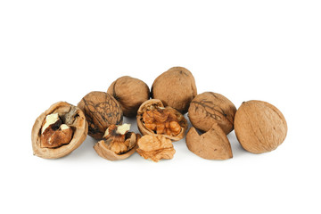 Heap of walnuts whole and chopped isolated on white background    
