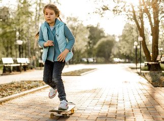 Fototapeta premium young woman walking in the park