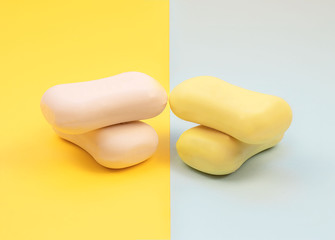 Bar soap on blue and yellow background