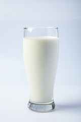 A Glass of fresh milk on white background.