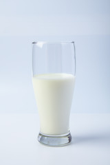 A Glass of fresh milk on white background.