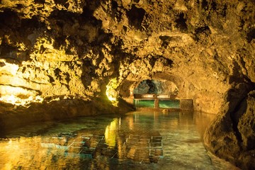An underground stream inside Sao Vicente Caves in Madeira