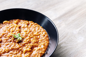 detail of a traditional rice on a white wood table