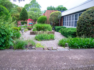 classic public garden on side of building in town