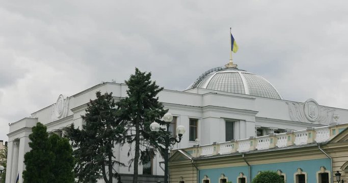 Ukrainian flag on top of parlament building in Kiev.