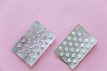 Two packages of tablets: finished and started. Space for text.