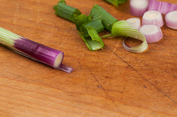 Onion on a cutting board isolated on a white background. Healthy food