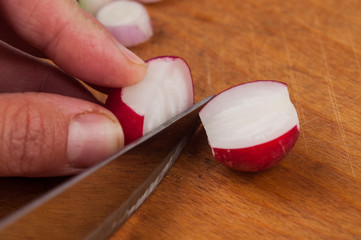 Onion on a cutting board isolated on a white background. Healthy food