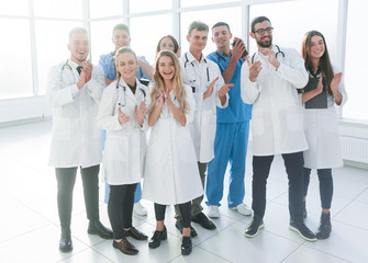 happy group of medical professionals showing their success.