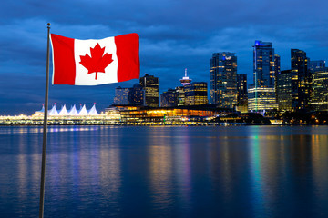 Canadian Flag Composite with Modern Downtown City during night in the background. Vancouver, British Columbia, Canada.