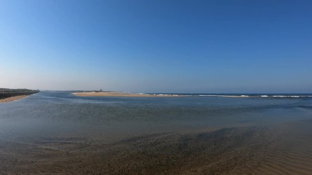Northern Litoral Natural Park in Esposende, Portugal. The two sides of Restinga de Ofir. One facing the ocean, the other the estuary of C&aacute;vado River. Cavado river mouth.