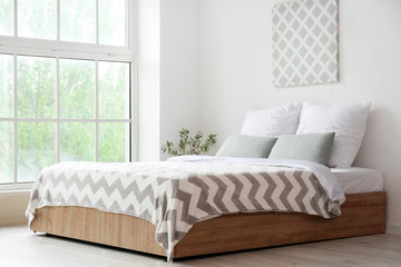 Interior of comfortable modern bedroom