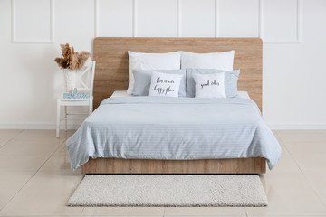 Interior of comfortable modern bedroom