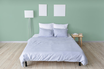 Fototapeta na wymiar Interior of comfortable modern bedroom
