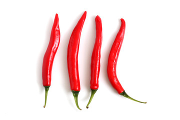 Collection of red hot chili peppers isolated on white background.