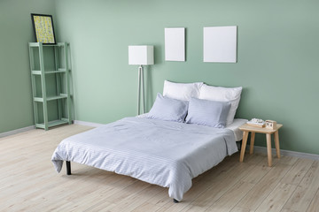 Fototapeta na wymiar Interior of comfortable modern bedroom