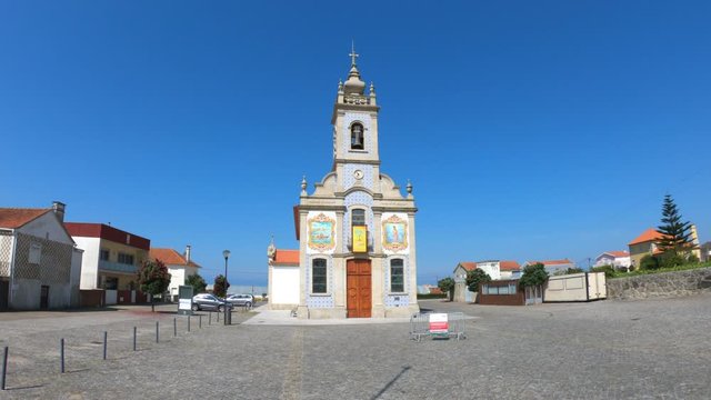 SLOW MOTION SHOT - The Parochial Church of Saint Bartholomew of the Sea in the parish of Mar, municipality of Esposende, North of Portugal.