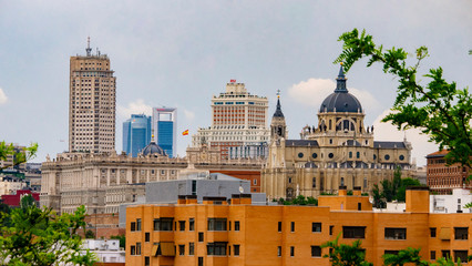 Fototapeta na wymiar MADRID, SPAIN - APRIL 20, 2020: SKYLINE OF MADRID WITHOUT CONTAMINATION DURING COVID-19. ROYAL PALACE, SPAIN SQUARE BUILDING, TOWER MADRID AND FINANCIAL DISTRICT TOWERS