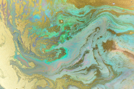 Pastel turquoise and gold ripplle pattern. Pale beautiful marble background.