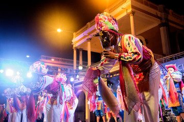 Traditional dance presentation at night.