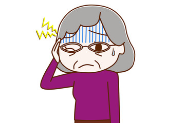 ズキズキと頭痛がひどい高齢の女性