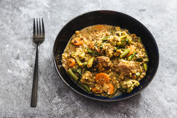 plant-based food, vegan buckwheat stew with carrots green beans and falafels