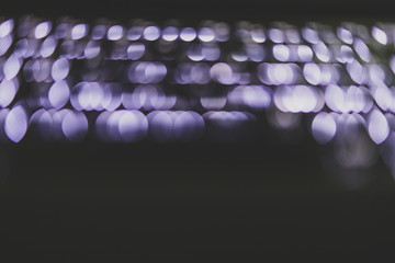 Obraz premium blurred background of backlit keyboard with led light